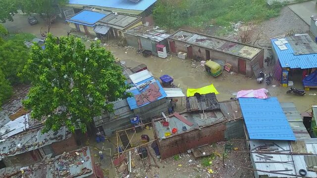 Raining slum area in delhi india