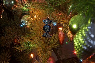 Soviet Christmas tree decorations and a garland hung on the tree