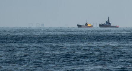 ships on the horizon of a blurred sea