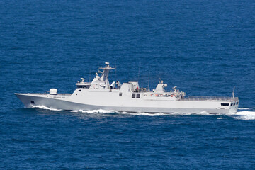 Warship sailing in the ocean.