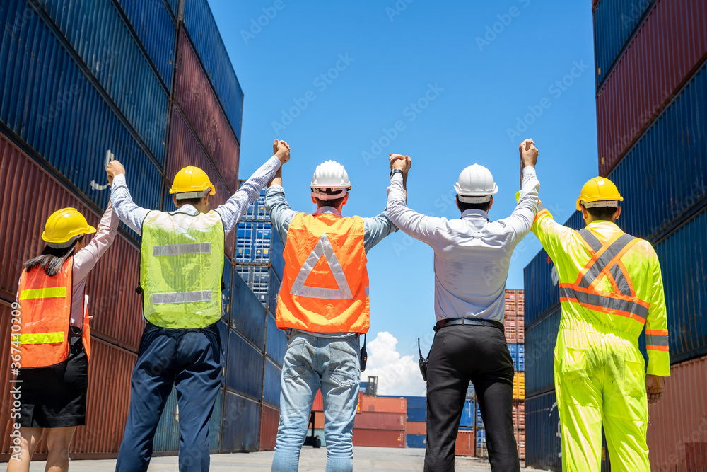 Poster engineer and worker team working at container yard port of import and export,business teamwork conce