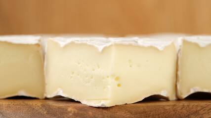 soft cheese Camembert Delicious pieces of white mold cheeses with soft textures Camembert close up