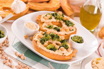 Friselle with turnip tops and hummus.
