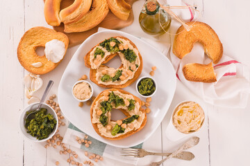 Friselle with turnip tops and hummus.
