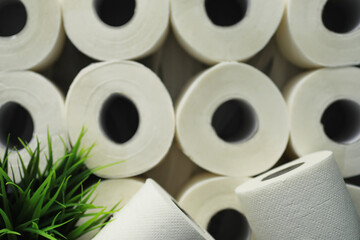 Toilet paper in a roll. Snow-white soft three-layer toilet paper. Lack of hygiene products. Primary protection and disinfection.