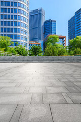 Empty square floor and modern commercial buildings in Shanghai,China.