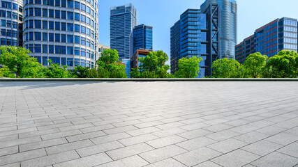 Empty square floor and modern commercial buildings in Shanghai,China.