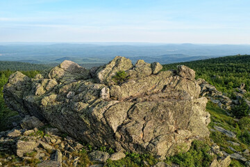 Fototapeta premium summer landscape in mountains. mountain rocks, slopes of Southern Ural. travel trip backdrop. national Park Taganay, Russia.