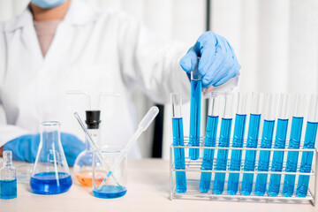 Medical scientists have experimented with liquid chemicals in vitro to analyze viral data in chemical laboratories. Scientific research concepts