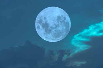 Full moon on the blue sky.
