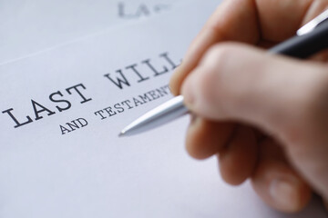 Legal concept. The procedure for writing the last will. Papers with testament on the table....
