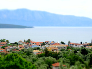 Fototapeta na wymiar Aerial view of Nikiana village around beach of Ionian Sea on Lefkada Island in western Greece. Lefkada island is one of series of Greek Ionian Islands.