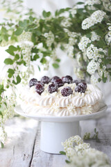 cake with cream and berries