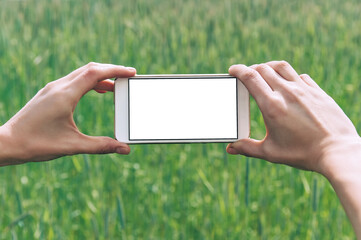 Mock-up of a smartphone in the hands of a girl