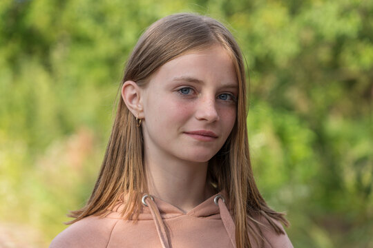 Portrait of a beautiful girl in nature, closeup