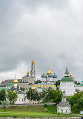 Fototapeta na wymiar Trinity-Sergius Lavra in Sergiev Posad in summer on a cloudy day