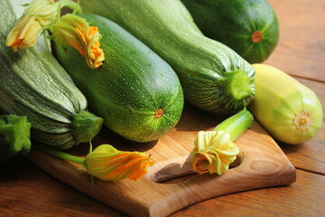 Fresh organic zucchini on the wooden table