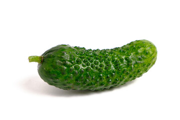 Fresh vegetable, cucumber on a white background in an isolate with shadows.