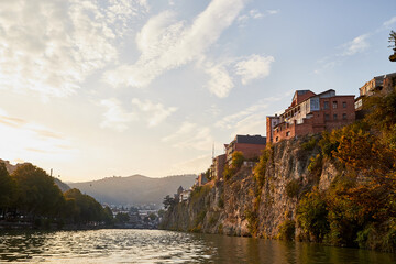 Tbilisi, Georgia - October 21, 2019: River Kura in capital of Georgia Tbilisi in a daytime and...