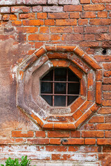 window in a red brick building