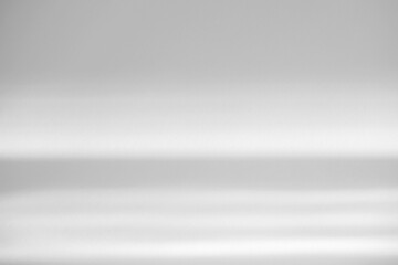 Obraz premium Overlay effect for photo and mockups. Organic drop diagonal shadow and rays of light from window on a white wall. shadows for natural light effects