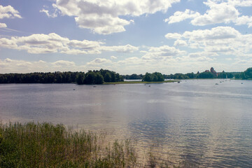 Beautiful landscape. Lake Galve in Lithuania. Green trees in a front
