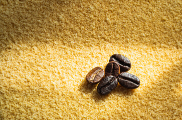 The image of roasted coffee beans heap on the cake, with morning light to use as a background image.