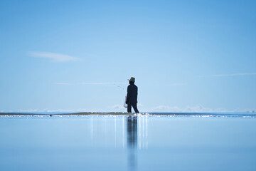 Naklejka premium Outdoor local lifestyle of fisherman on the beach sea in the late morning