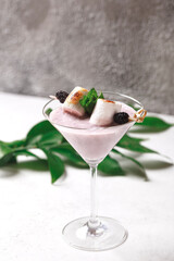 Cocoa latte marshmallow and BlackBerry. Milkshake with berries. 