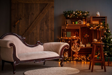New Year's cozy decor in a beautiful house. Toys, sofa, garlands, books, holiday atmosphere.