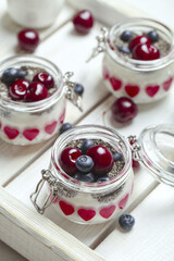 Healthy breakfast with natural yogurt, muesli, chia and berries. Close up
