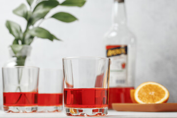 Aperol spritz cocktail in glass with oranges. Summer italian fresh alcohol cold drink