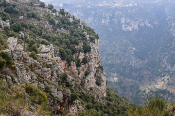 Fototapeta na wymiar Rocky walls near Blouza village in Kadisha Valley also spelled as Qadisha in Lebanon