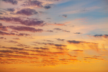 Dramatic colorful red purple to blue sunset or sunrise sky landscape. Natural beautiful cloudscape dawn background wallpaper. Stormy windy nature twilight dusk scene panorama
