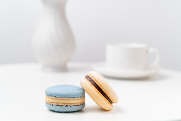 macarons on background Cup and vase.
