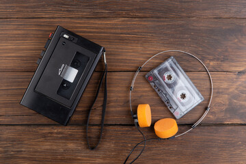 Music concept. Cassette tape player and headphones.Vintage tape recorder