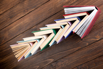 Arrow Shape made of books love to wisdom, science and education. Reading and writing concept