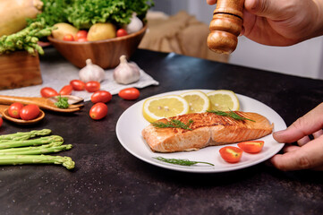 Fresh Salmon steak with salad. Online learning for cooking diet and healthy food when stay at home...