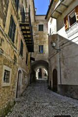 A narrow street in the old buildings of San Donato Val di Comino, a medieval village in the Lazio region.
