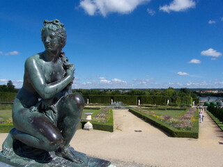 Versailles, France, the palace of Versailles with a beautiful garden in front of facade with a lot of fountains and statues