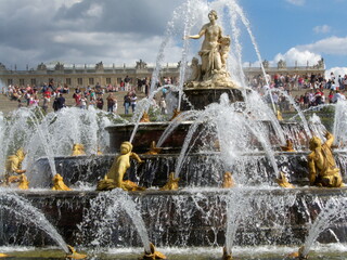 Versailles, France, the palace of Versailles with a beautiful garden in front of facade with a lot of fountains and statues