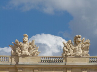 Versailles, France, the palace of Versailles with a beautiful garden in front of facade with a lot of fountains and statues