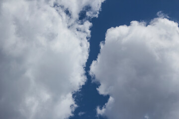 Obraz premium White clouds on blue sky,background,concept.