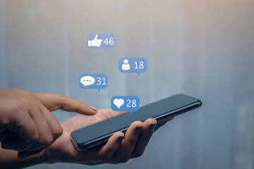 Hand using smartphone with social media concept.