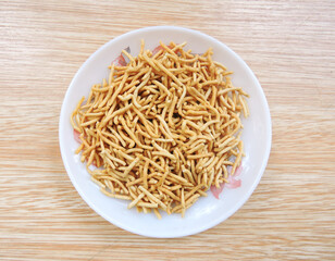 A popular crispy snack prepared by using moth beans, besan and spices. It is called Bhujia in local language in India. It originated from Bikaner, India. 