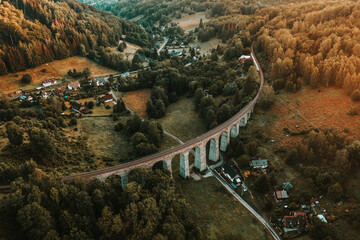 Obraz premium The railway viaduct was built near the village of Novina on the line from Liberec to Česká Lípa between 1898 and 1900. The viaduct, which has 14 arches, is 230 meters long and approximately 29 meters.