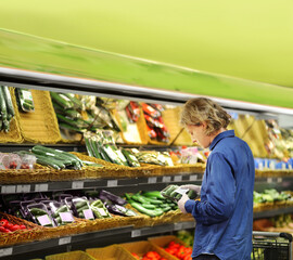 Supermarket shopping,  gloves,man buying vegetables at the market	