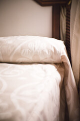 Fototapeta na wymiar Antique bed with vintage bedspread