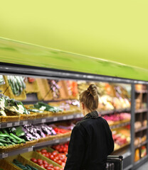 Supermarket shopping,  gloves,woman buying vegetables at the market	