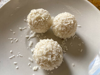 coconut candy on a white plate
